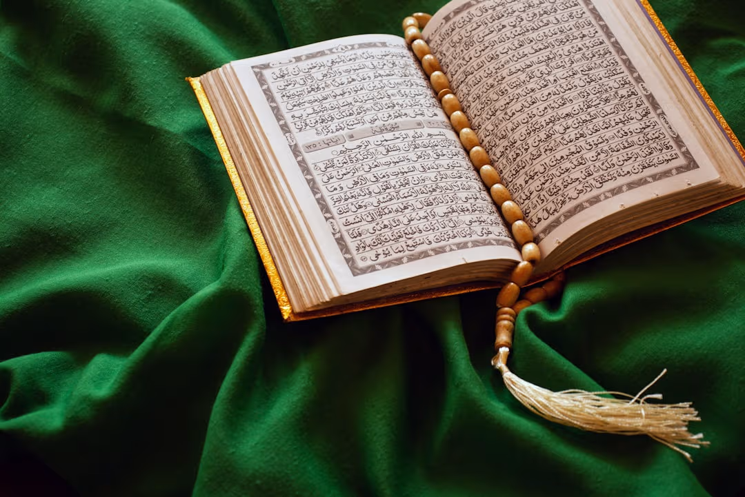 Open Quran page symbolizing the Islamic belief in the oneness of Allah known as Tawheed